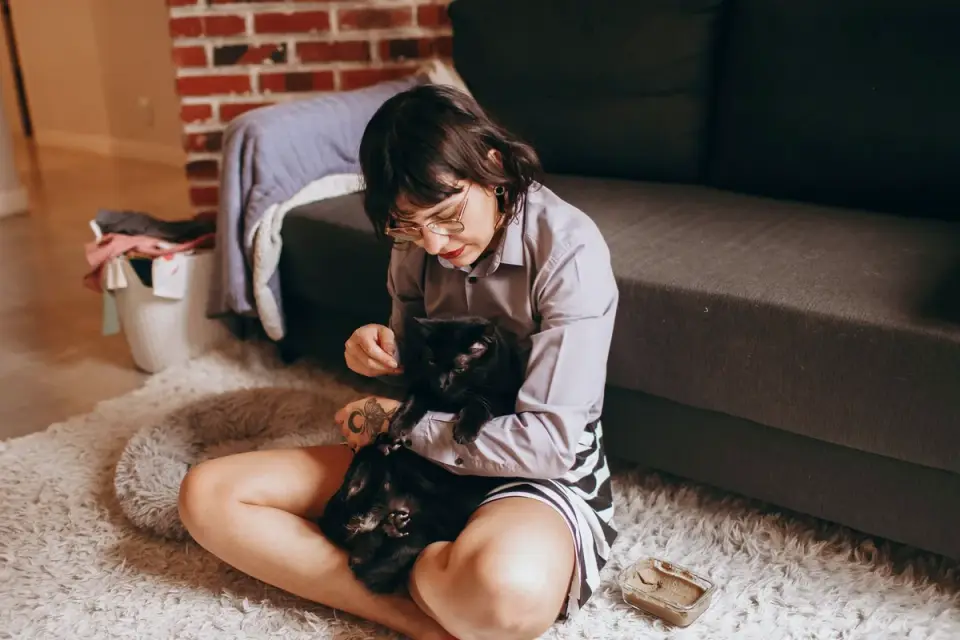 A veterinarian and dog owner reviewing a supplement label together