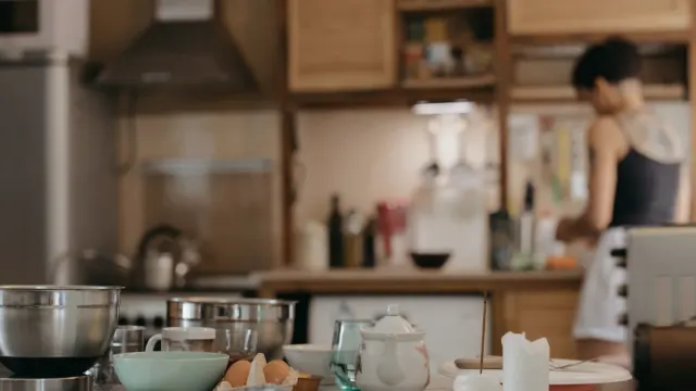 Dog owner preparing a meal