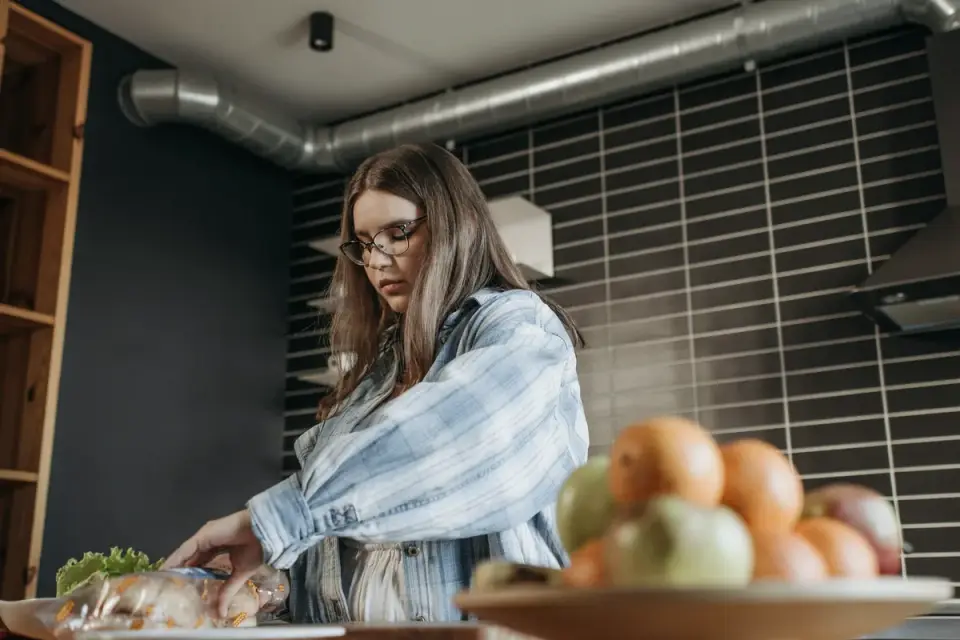 Dog owner preparing a meal