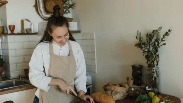 Dog owner preparing a meal