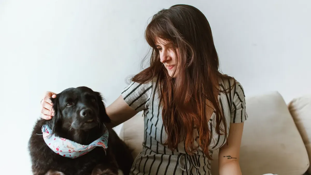 Dog with an owner at home